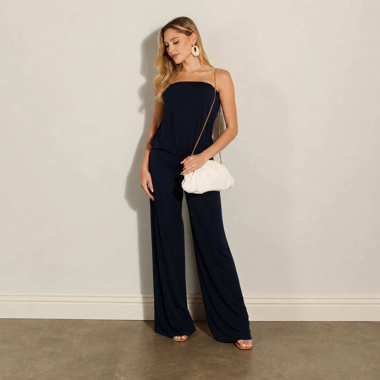 Black bandeau boobtube jumpsuit with a relaxed wide-leg fit Black bandeau boobtube jumpsuit with a relaxed wide-leg fit
