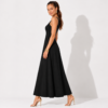 Sleeveless black maxi dress with raised waist seam, side view