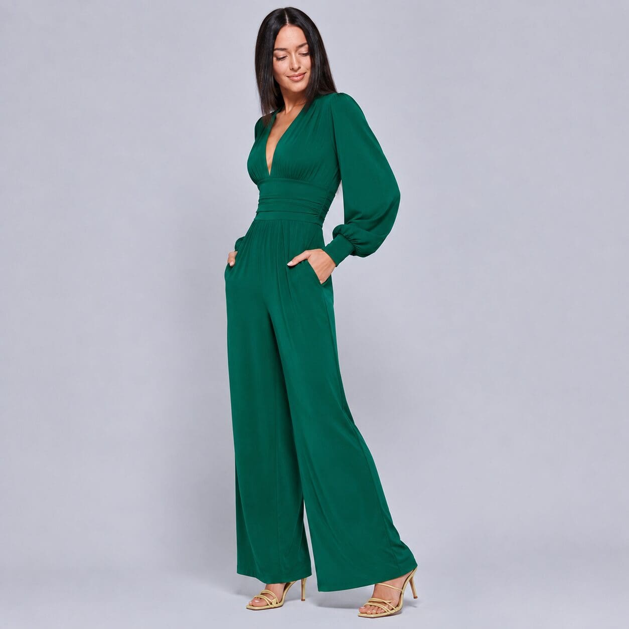 Emerald green Plunge Neck Jumpsuit Wide leg made in South Africa Image With bishop sleeve and cuff Emerald green Plunge Neck Jumpsuit Wide leg made in South Africa Image With bishop sleeve and cuff